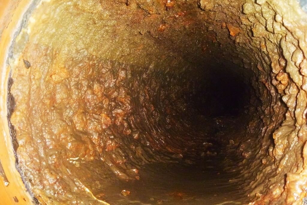 Sedimentation of Scale Calcium Carbonate, sludge and Corrosion products in the main pipeline of the cooling system.